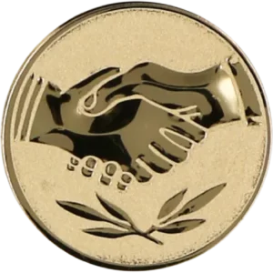 A golden medal with a handshake and olive branch design, symbolising partnership and peace.